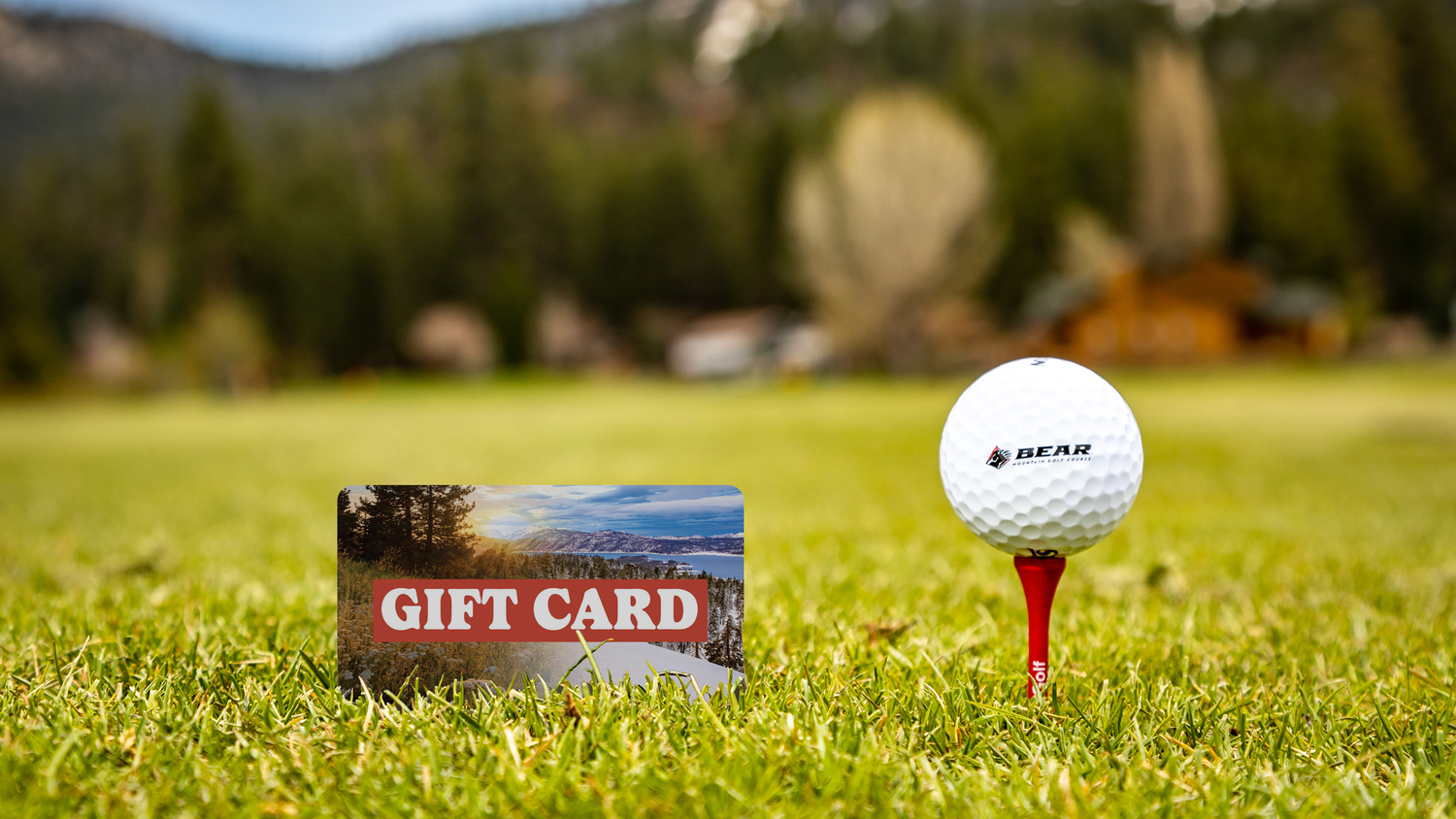 Gift Card on a golf course with a golf ball next to it