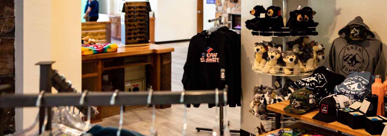 BBMR Visitor's Center Station retail floor with products displayed on tables and racks