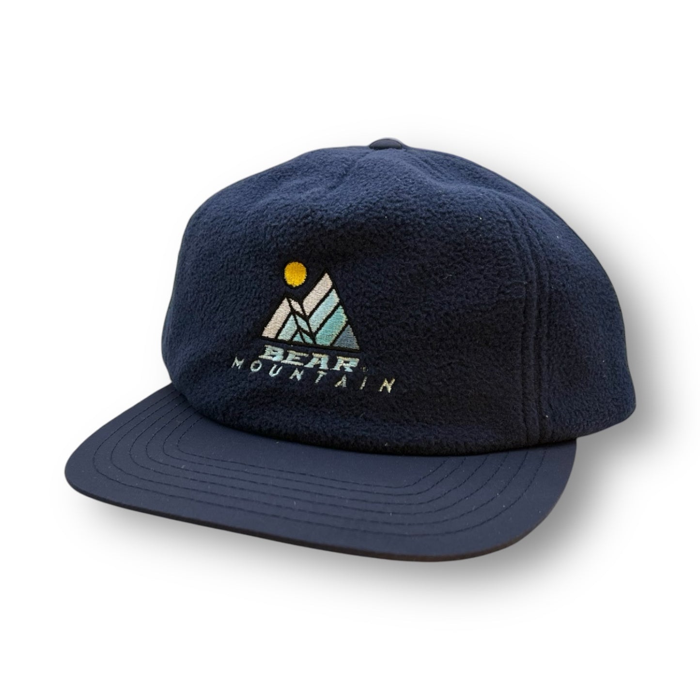 Dual mountain w/sun logo, blue fleece cap with bear mountain logo with sun and mountain design