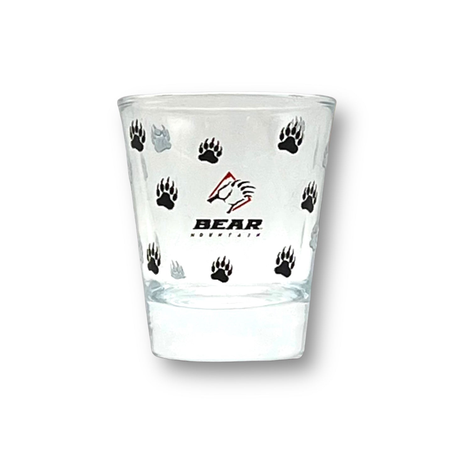 Shot glass with bear mountain logo printed around it