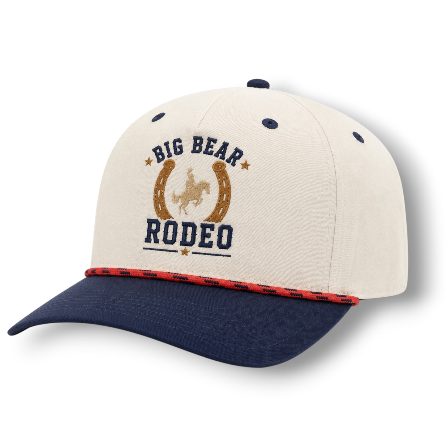 White and navy hat with a horseshoe and Big Bear Rodeo font on a white background