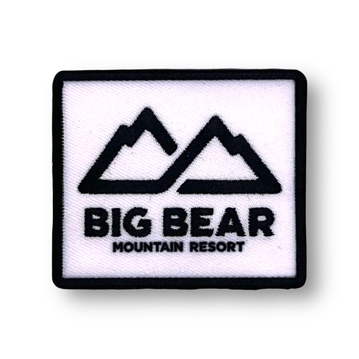 black and white patch with big bear mountain resort logo on it