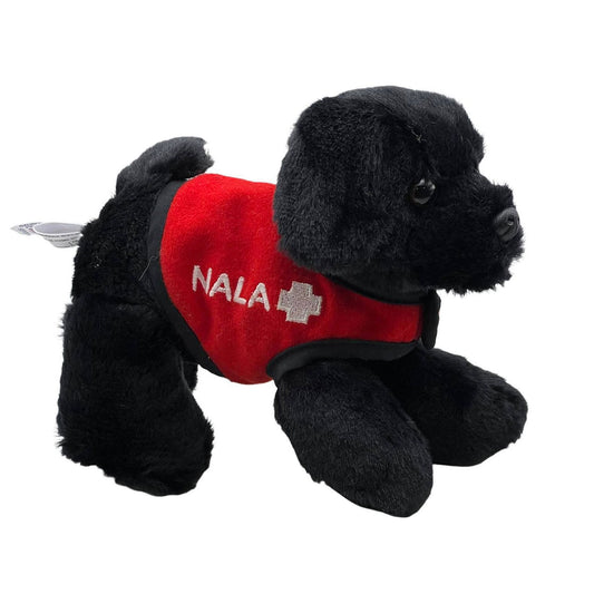Black stuffed animal dog with a red vest and Nala name printed on vest