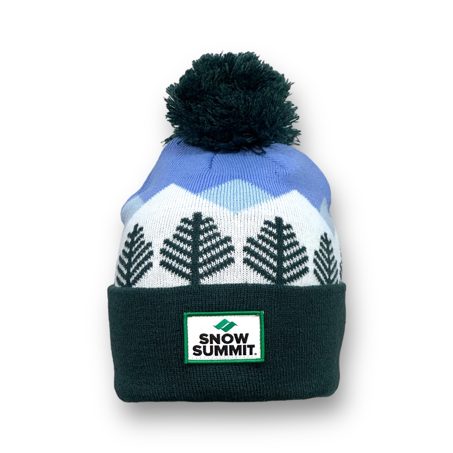 Beanie portraying stitching of trees and a blue stitched sky with snow summit logo patch on cuff of beanie and dark green pom pom on top.