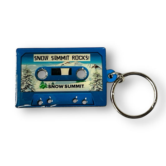 Blue Cassette tape with Summit Logo and Snow Summit Rocks, snowy background
