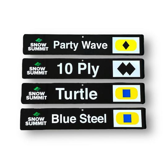 Black trail signs with Snow Summit runs: Party Wave, 10 Ply, Turtle, and Blue Steel
