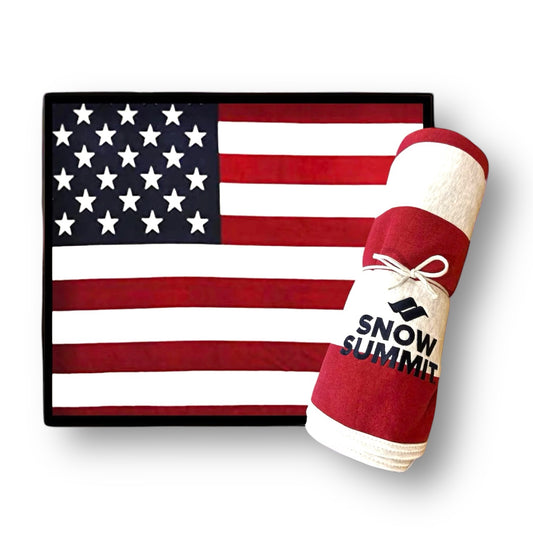 Snow summit logo on red, white, and blue flagged blanket