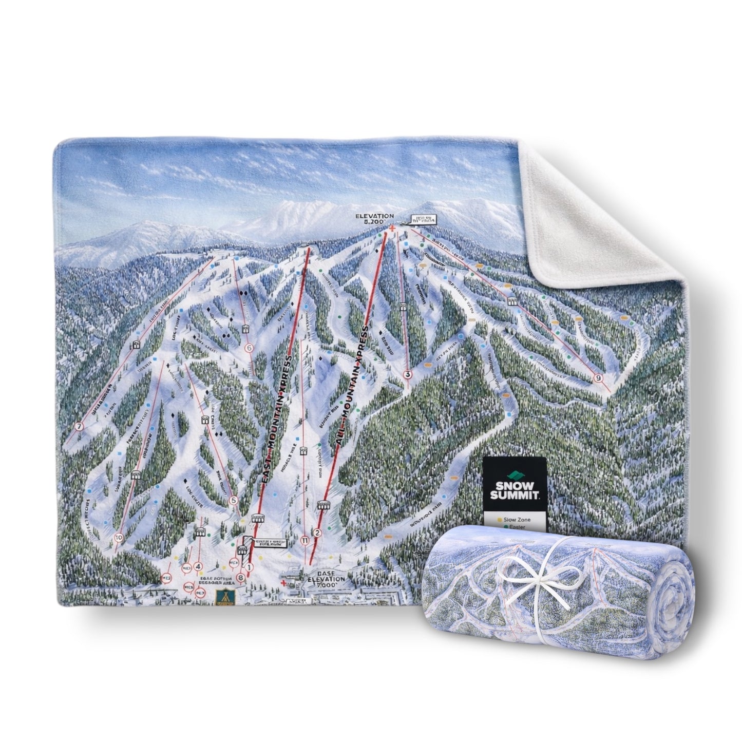 A blanket with Snow Summit's winter trail map on one side, with an opposing blank white side.