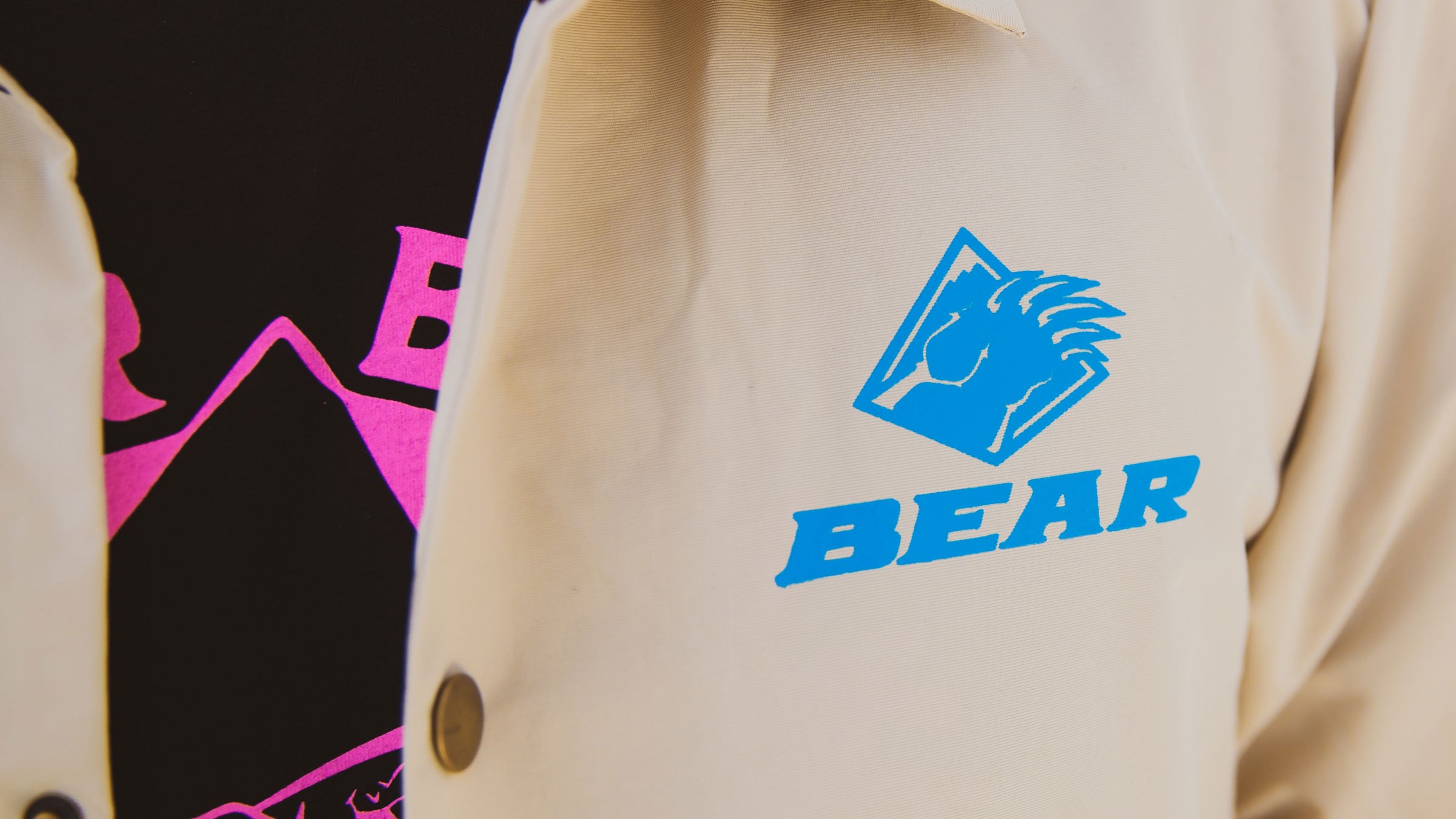 Bear Mountain khaki coaches button up jacket with blue bear claw logo