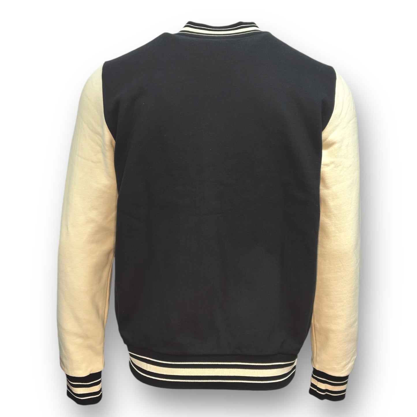 Backside of a black letterman jacket with almond colored sleeves