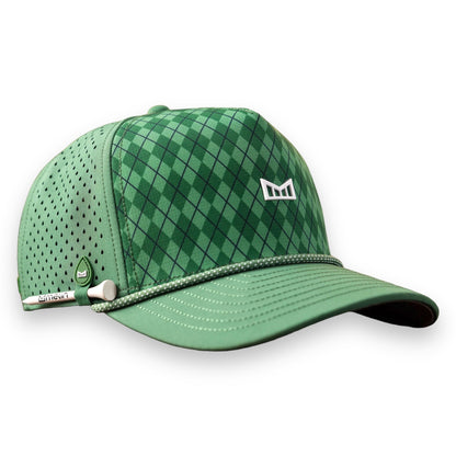 Melin green snapback hat in argyle pattern with a golf tee holder on the right side