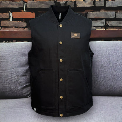 Black button up vest with two large pockets on each side and a brown snow summit patch on upper left side