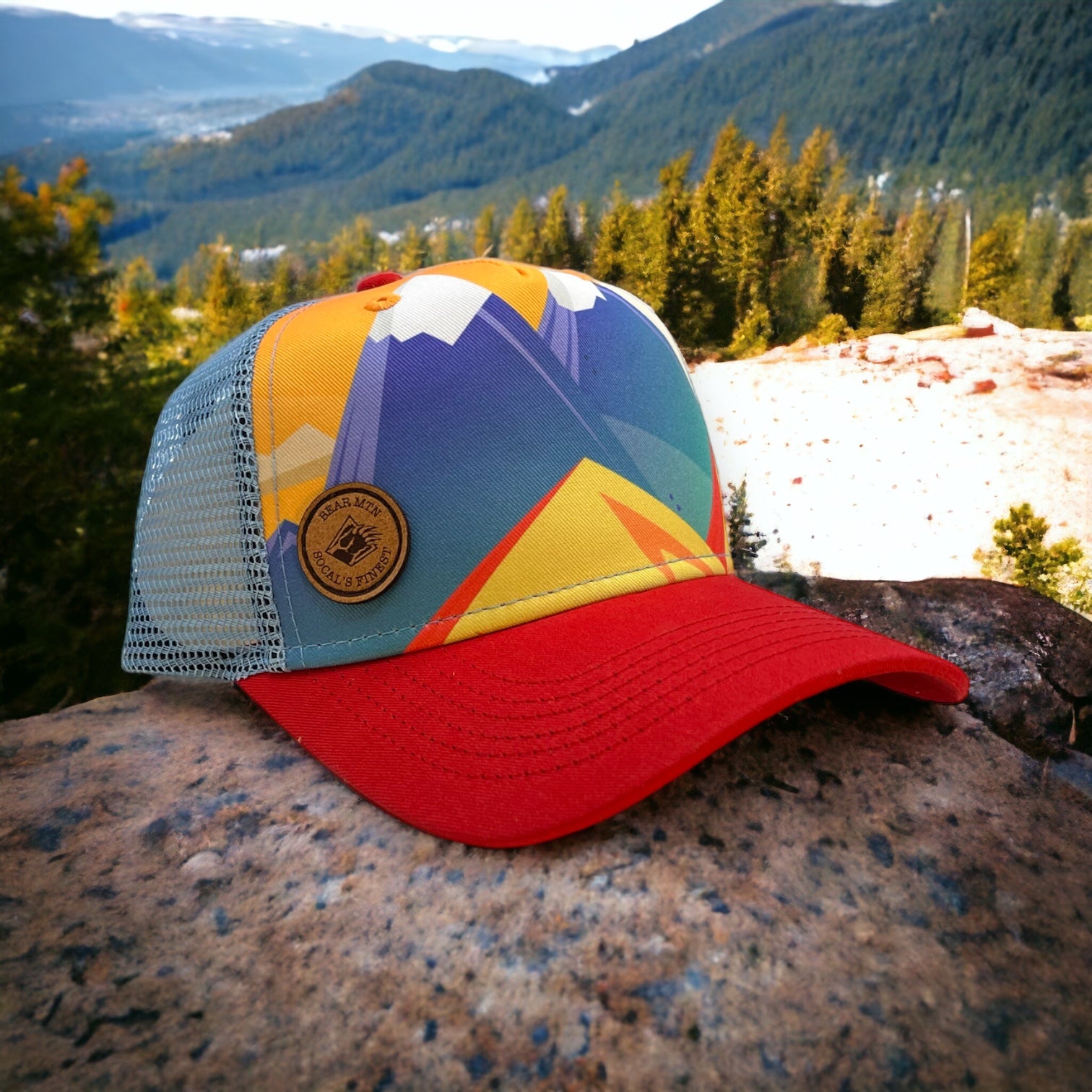 Mountain photo with Red Bill and a leather Bear Mountain Patch