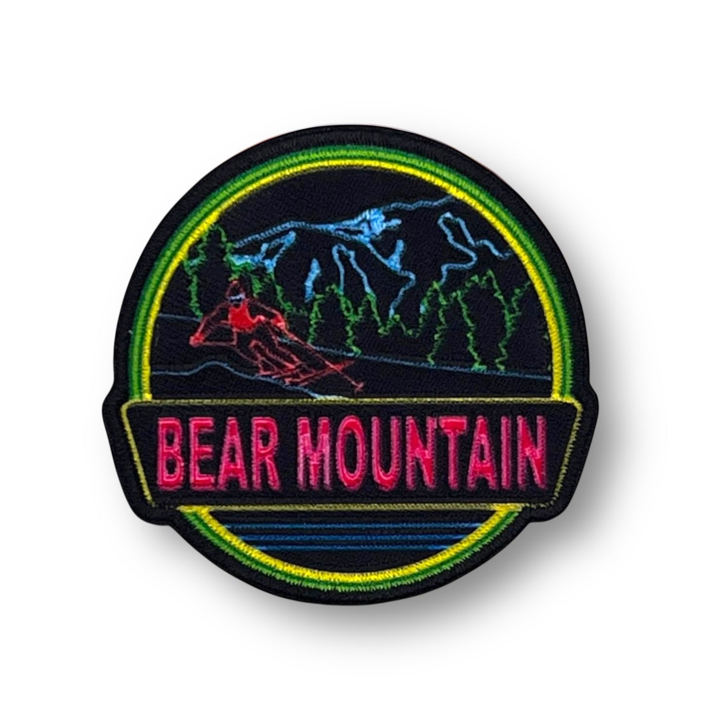 neon black and green patch with a bear mountain logo on it