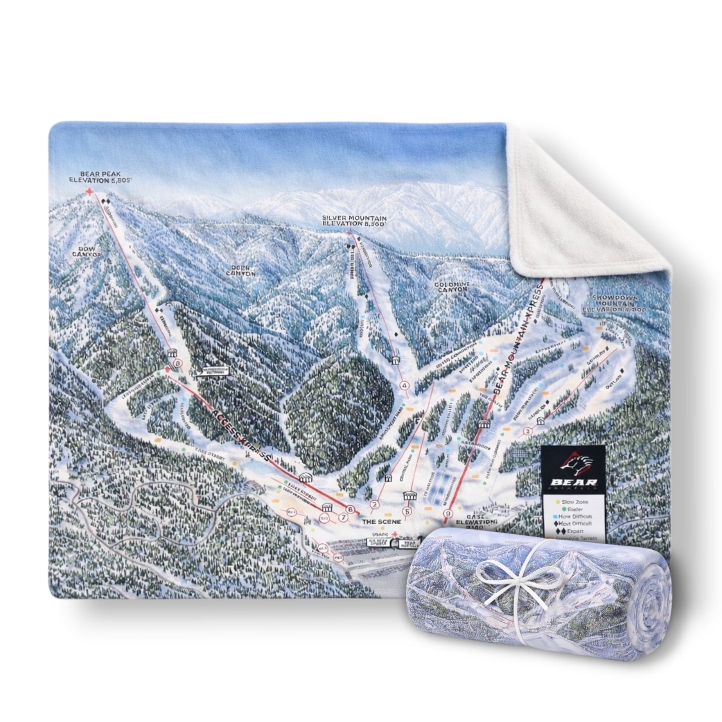 A blanket with Bear Mountain's winter trail map on one side, with an opposing blank white side.