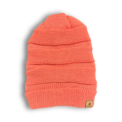 Bear mountain slouch beanie in coral color with logo on bottom left corner