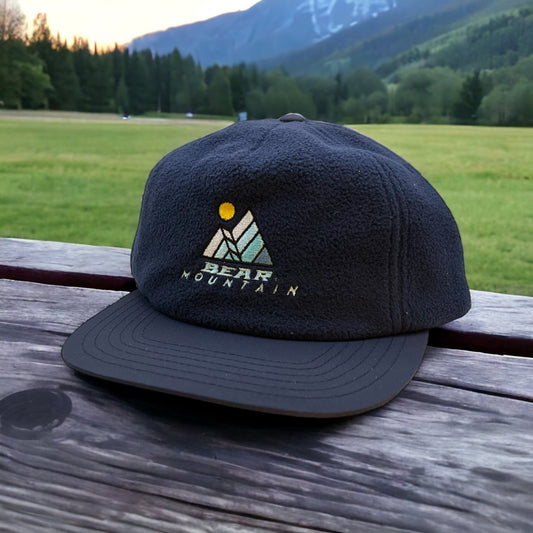 Dual mountain w/sun logo, blue fleece cap with bear mountain  logo with sun and mountain design