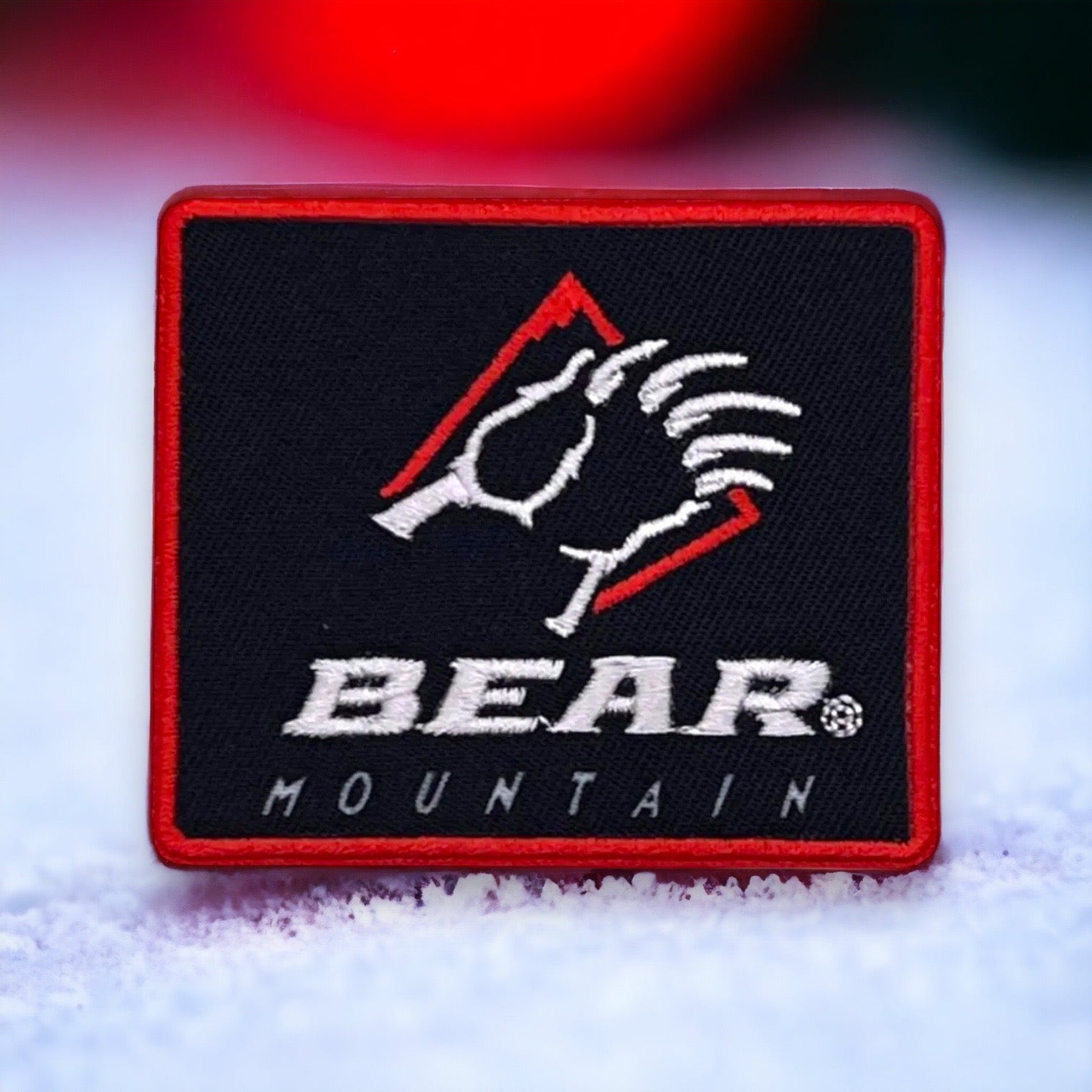 black patch with bear mountain logo on it