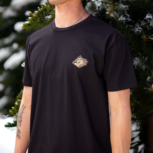 Black shirt with Bear Mountain logo on left over heart