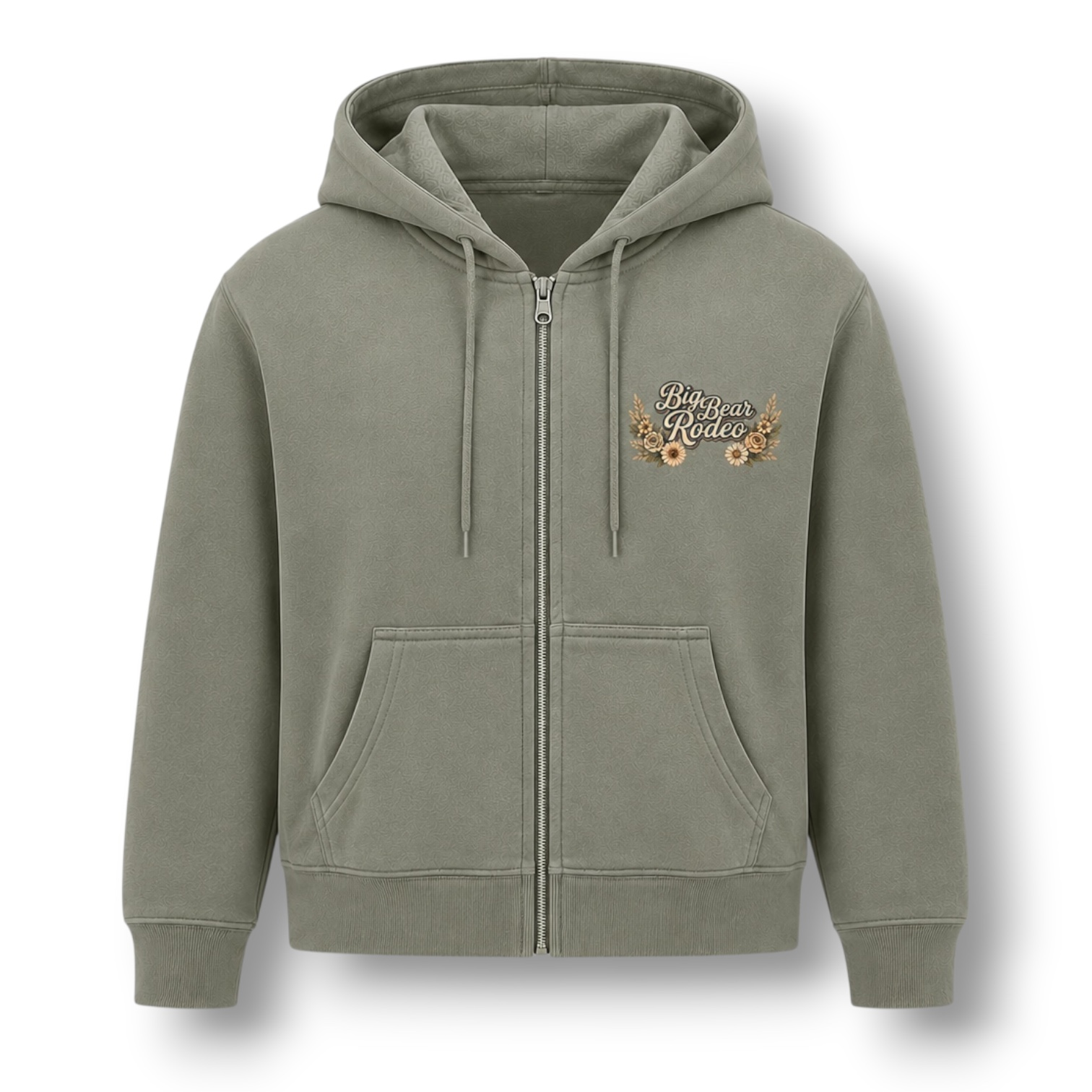 A sage green zip-up hoodie shown from the front. The front features a small 'Big Bear Rodeo' graphic on the left chest surrounded with flowers.