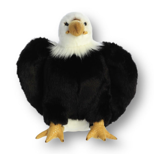 Bald eagle stuffed plush animal with white head, black body, yellow beak and feet. 