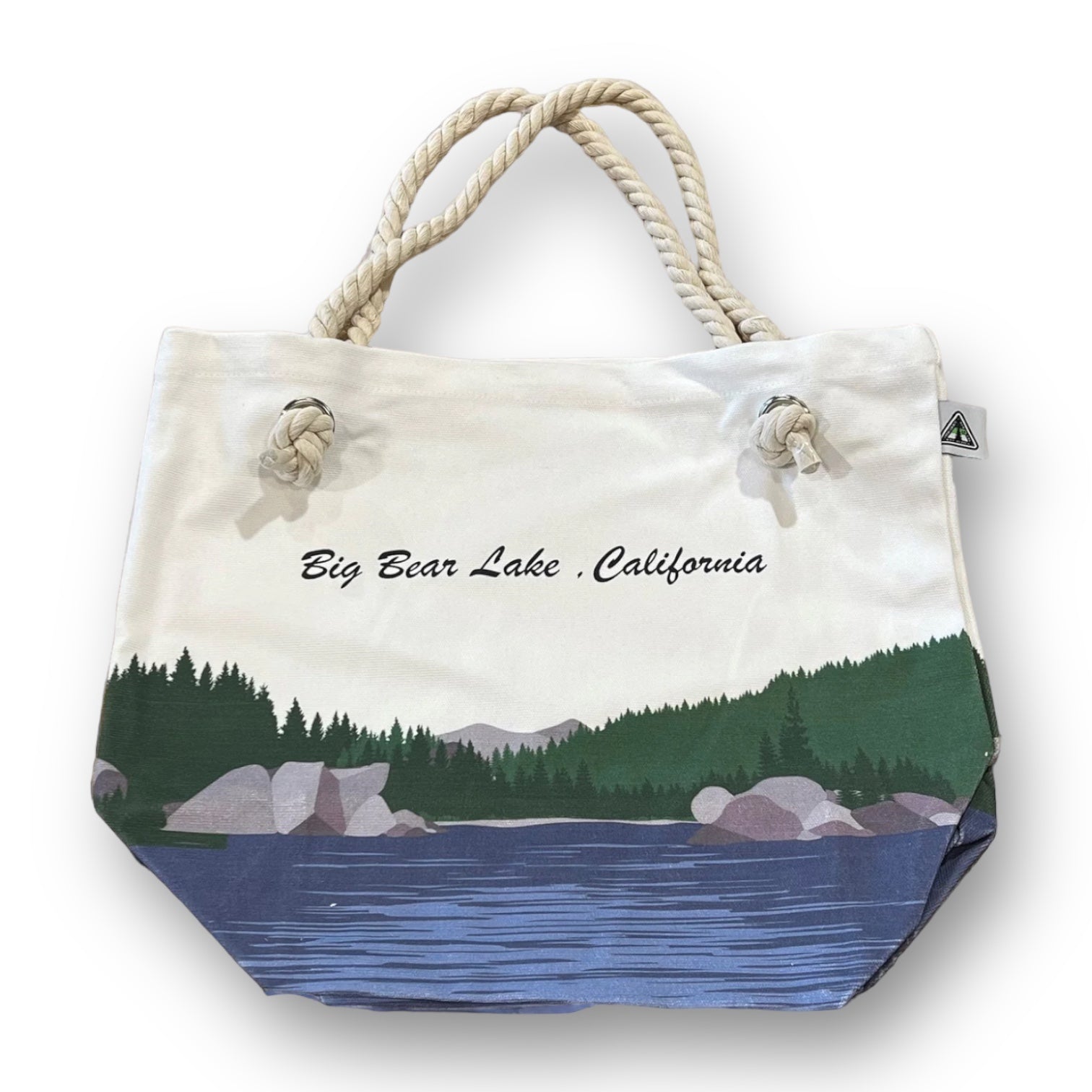Natural color tote bag with big bear lake design with a rope handle.
