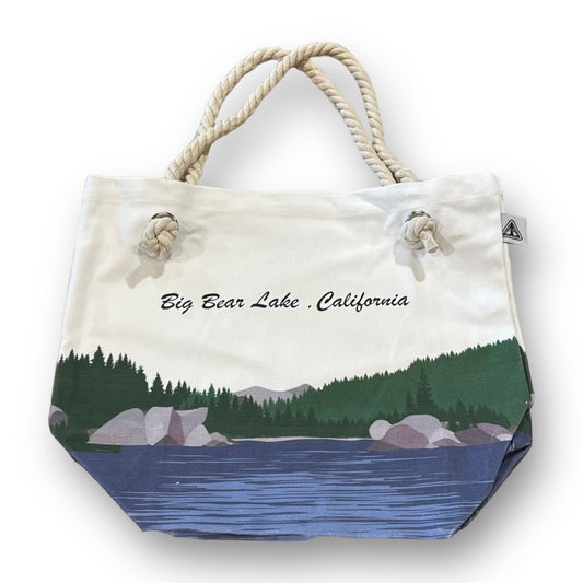 Natural color tote bag with big bear lake design with a rope handle.