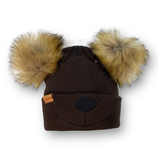 Beanie with nose and mouth stitching on cuff of beanie.  Two buttons as eye on crown of beanie.  Two fur pom poms on either side of top as ears and a BBMR patch on cuff.