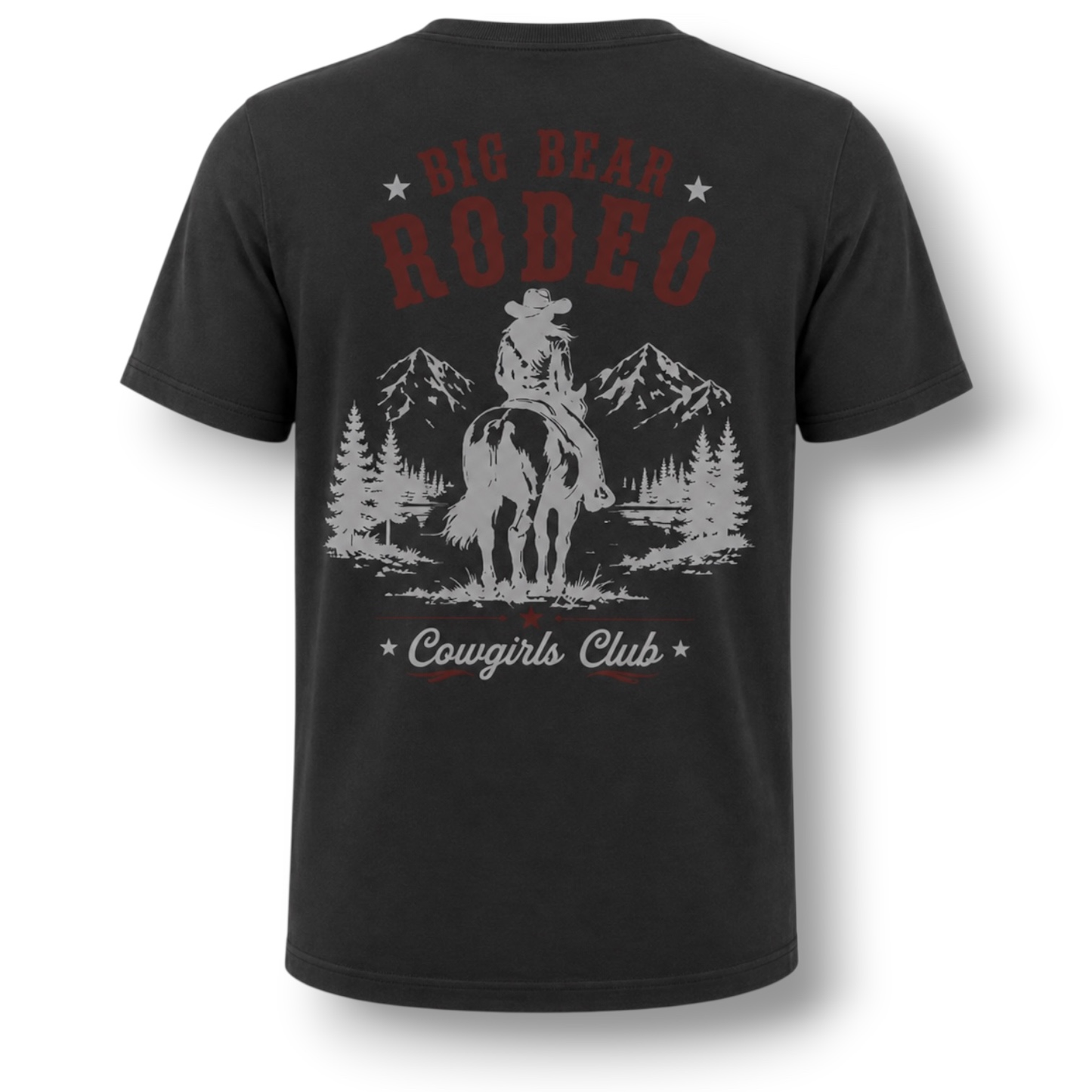 A dark gray t-shirt shown from the back, featuring a distressed graphic print of a cowgirl on a horse with mountains and pine trees, and text reading 'Big Bear Rodeo' and 'Cowgirls Club'.