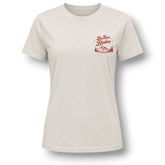 An off-white crewneck t-shirt with a small red graphic on the left chest reading 'Big Bear Rodeo' with a mountain and trees, displayed flat against a white background.