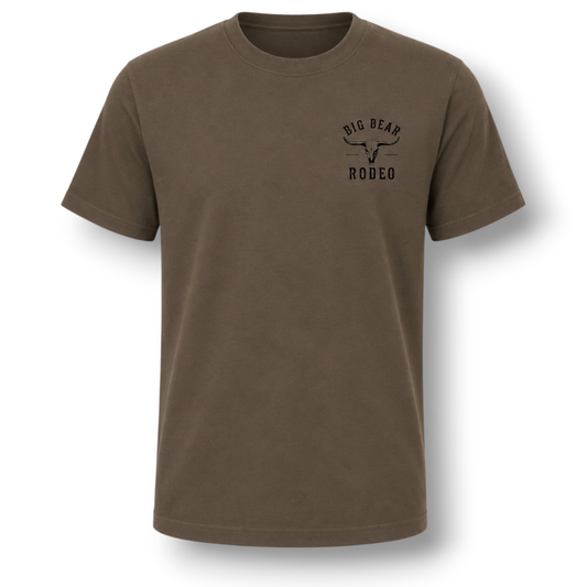 A dark short-sleeve crewneck t-shirt with a black 'Big Bear Rodeo' graphic printed on the left chest, displayed flat against a white background.