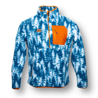 The front of a soft quarter zip fleece jacket with orange zipper lining, an orange front chest pocket, leather patch, and white and blue alpine tree design.