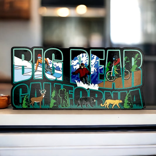 Big Bear California written on a magnet with snowboard and mountain biking activities in the letters