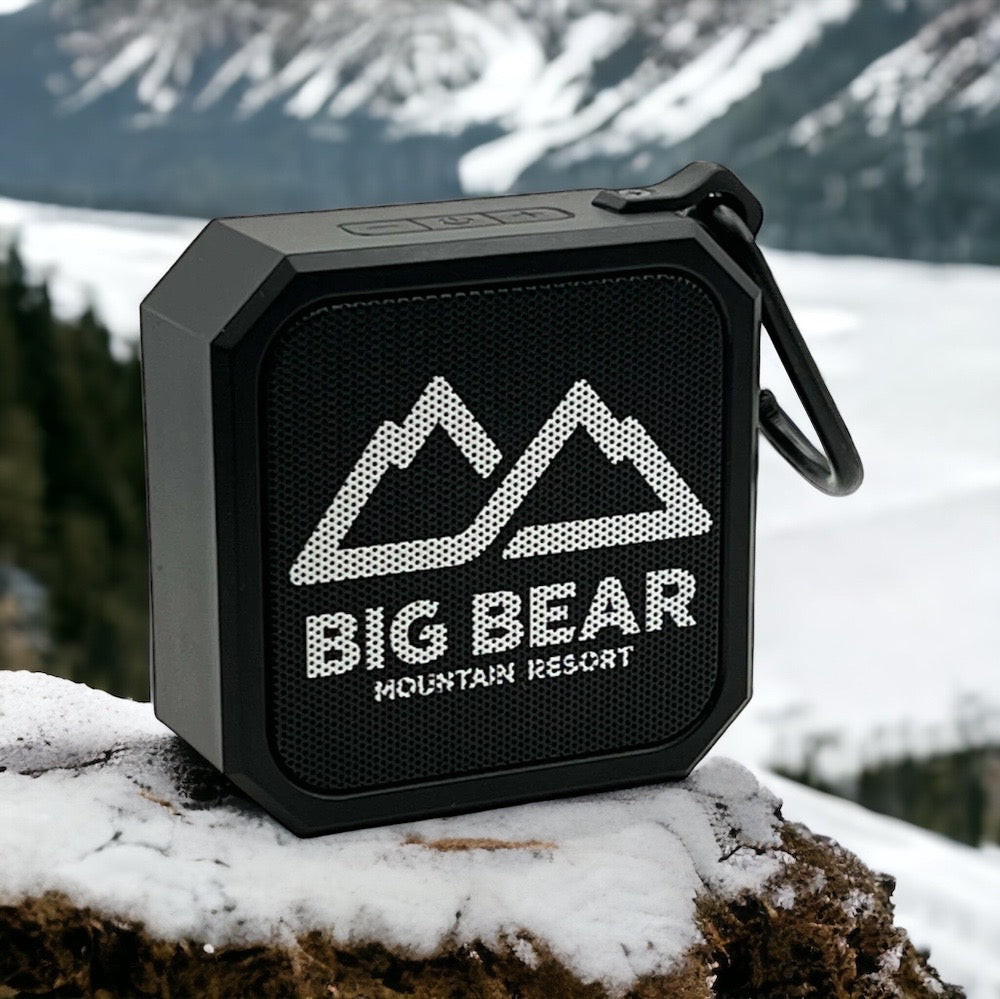Black mini bluetooth speaker with clip and Big Bear Mountain Resort logo