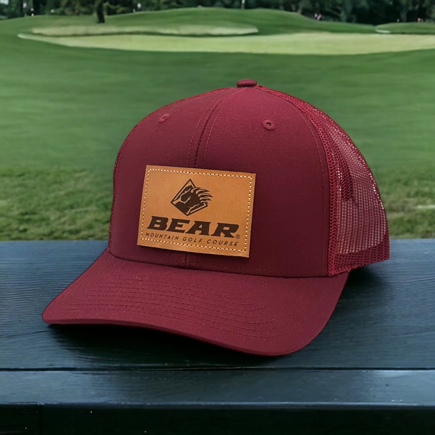 Cardinal trucker had with bear mountain logo on a leather patch on the front