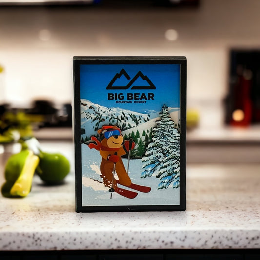 Big bear mountain resort wooden magnet with biggie the bear skiing with mountains snow and trees in background
