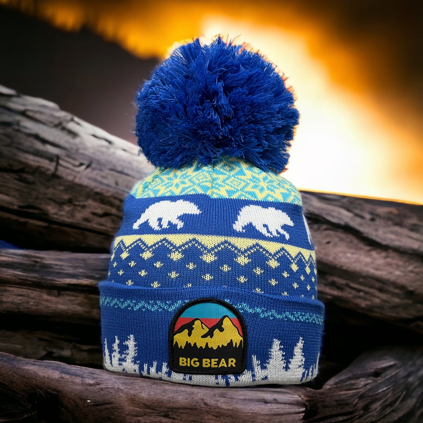 Big Bear Logo Patch w/ mountains and trees. Mixed Blue and yellow patterns throughout the beanie w/ white polar bears