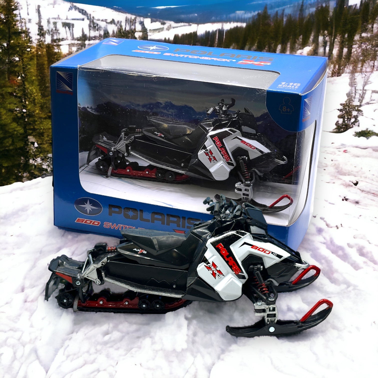 A Polaris Snowmobile Toy replicating what we use on the mountain