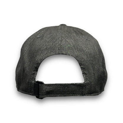 Backside of charcoal hat with velcro adjustable back