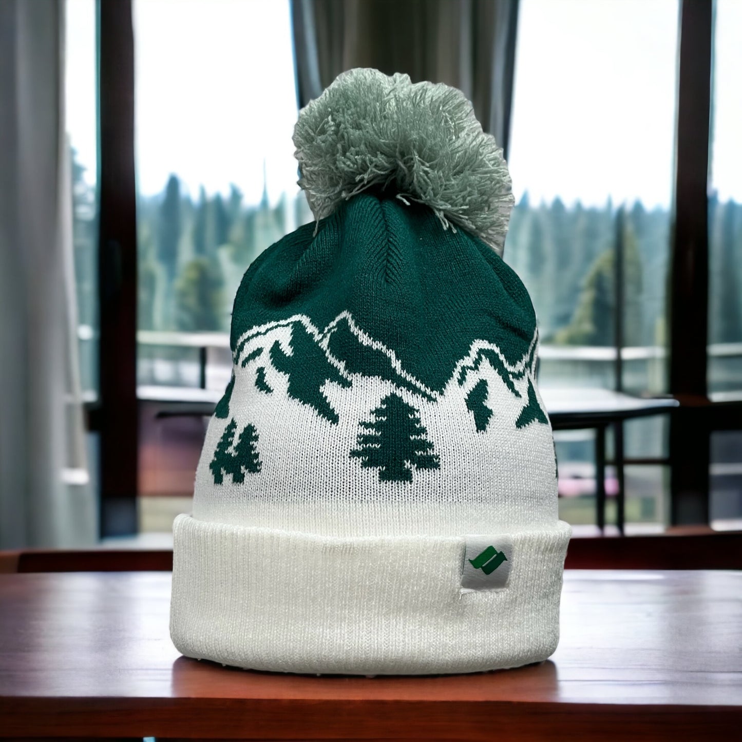 Green and White with mountain scape. Snow Summit tag on the left corner.