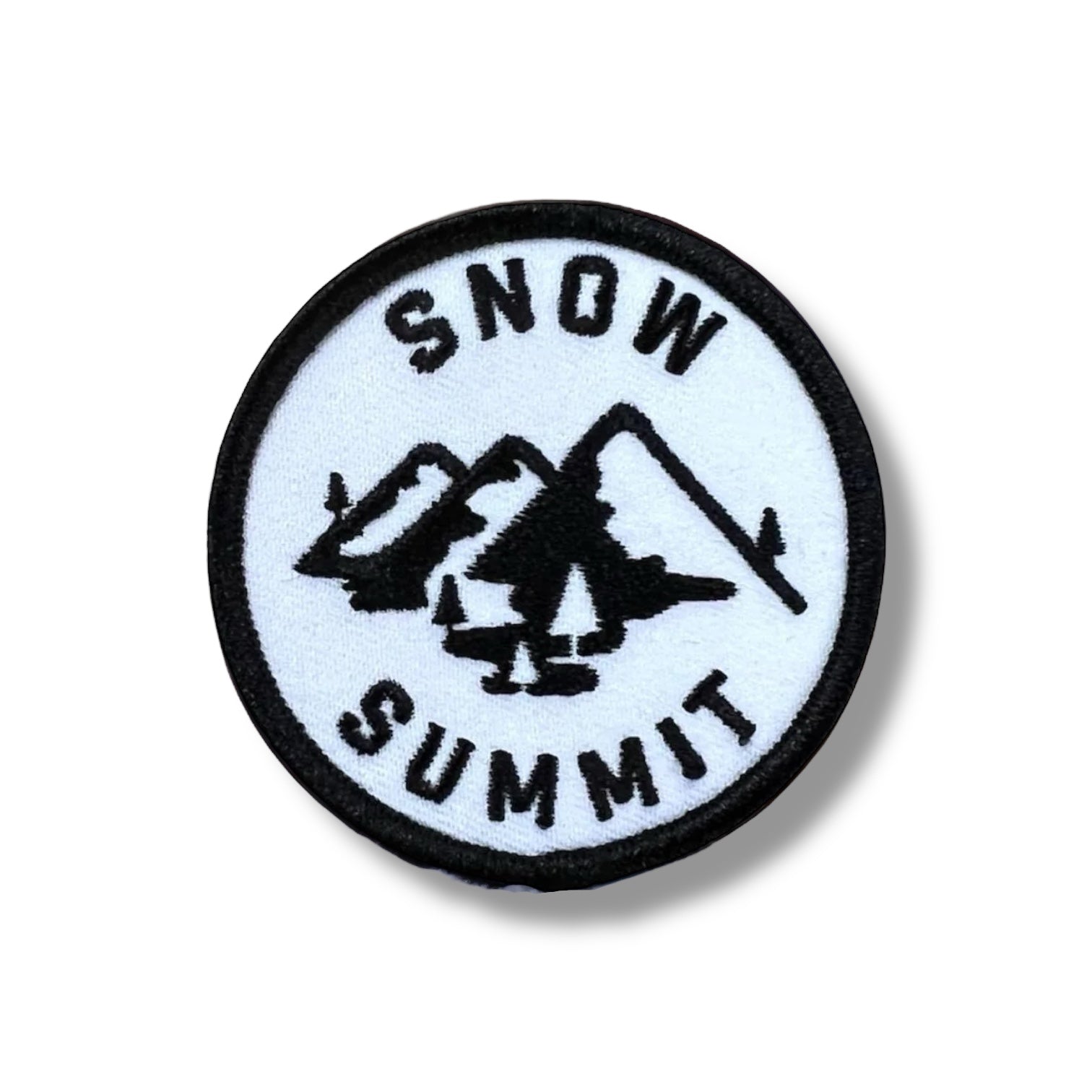 White patch with a snow summit logo and mountain stiched on it