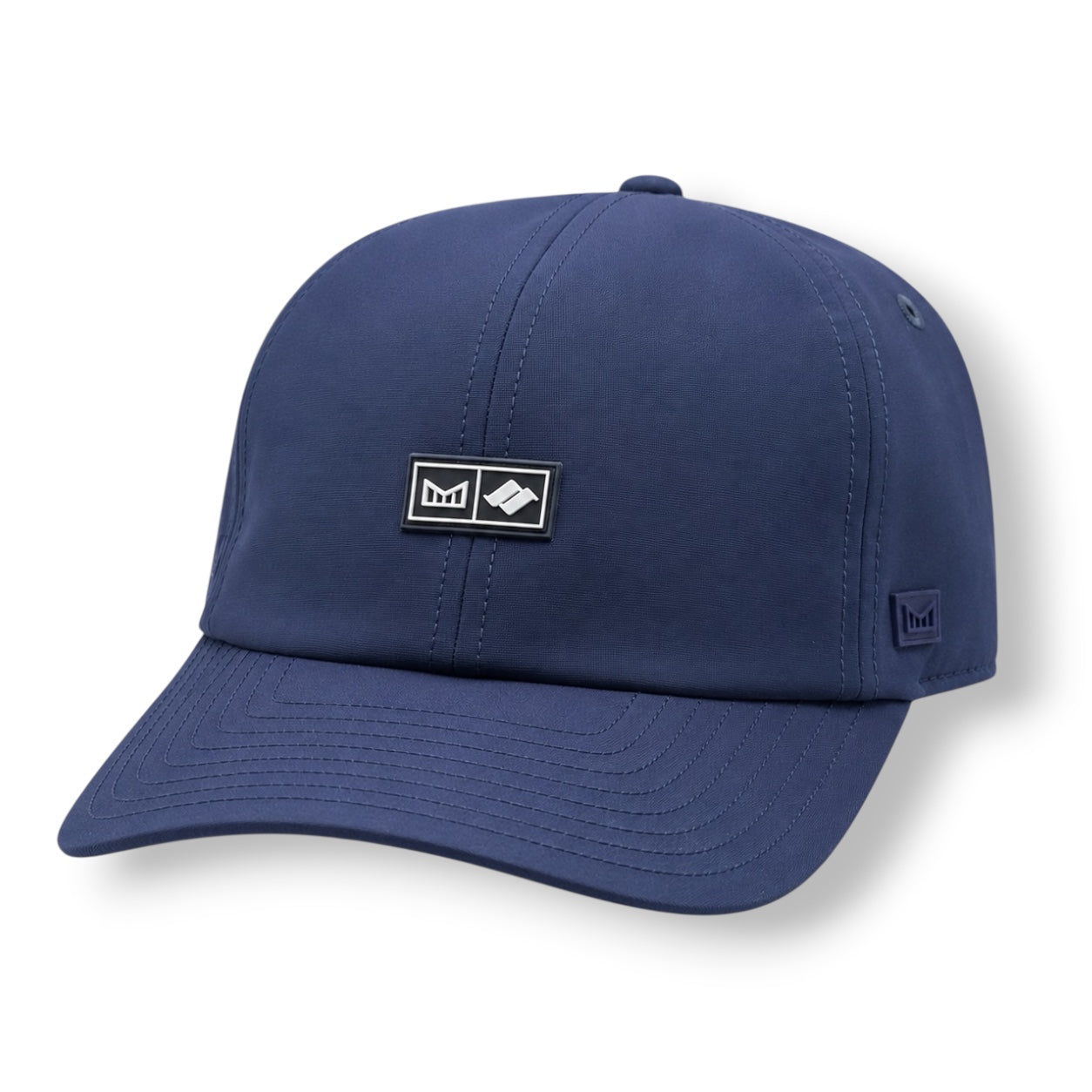 The frontside of a navy color Melin strap hat with Snow Summit logo on front.