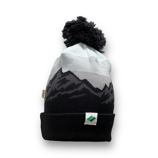 Charcoal and Black patterns with mountain scape. Snow Summit tag on the left corner.
