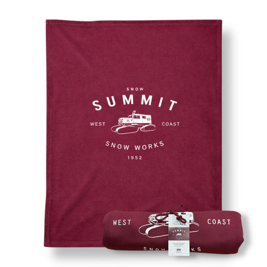 Maroon blanket with Snow Summit West Coast Snow Works  1952 print and snow cat logo in white.