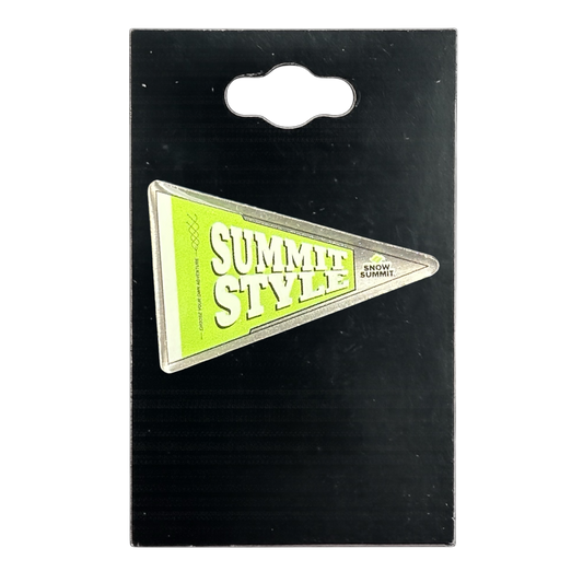 A triangular pennant-style pin with the words “SUMMIT STYLE” and “SNOW SUMMIT” in white on a bright yellow-green background, attached to a black retail display card.