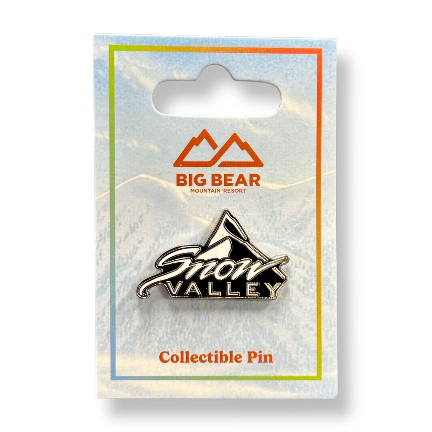 Collectible Snow Valley logo pin in black and white.