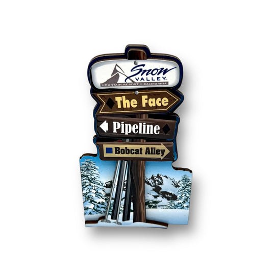 Wooden magnet with Trail signs point in different directions