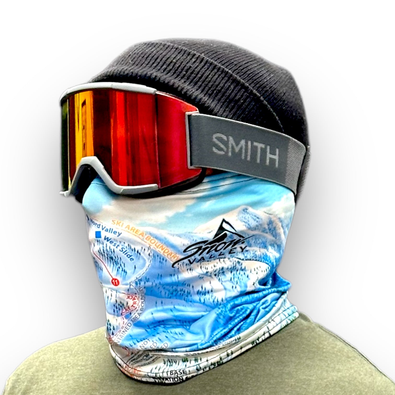 Rider in black beanie, Smith goggles, and a Snow Valley winter trail map neck gaiter