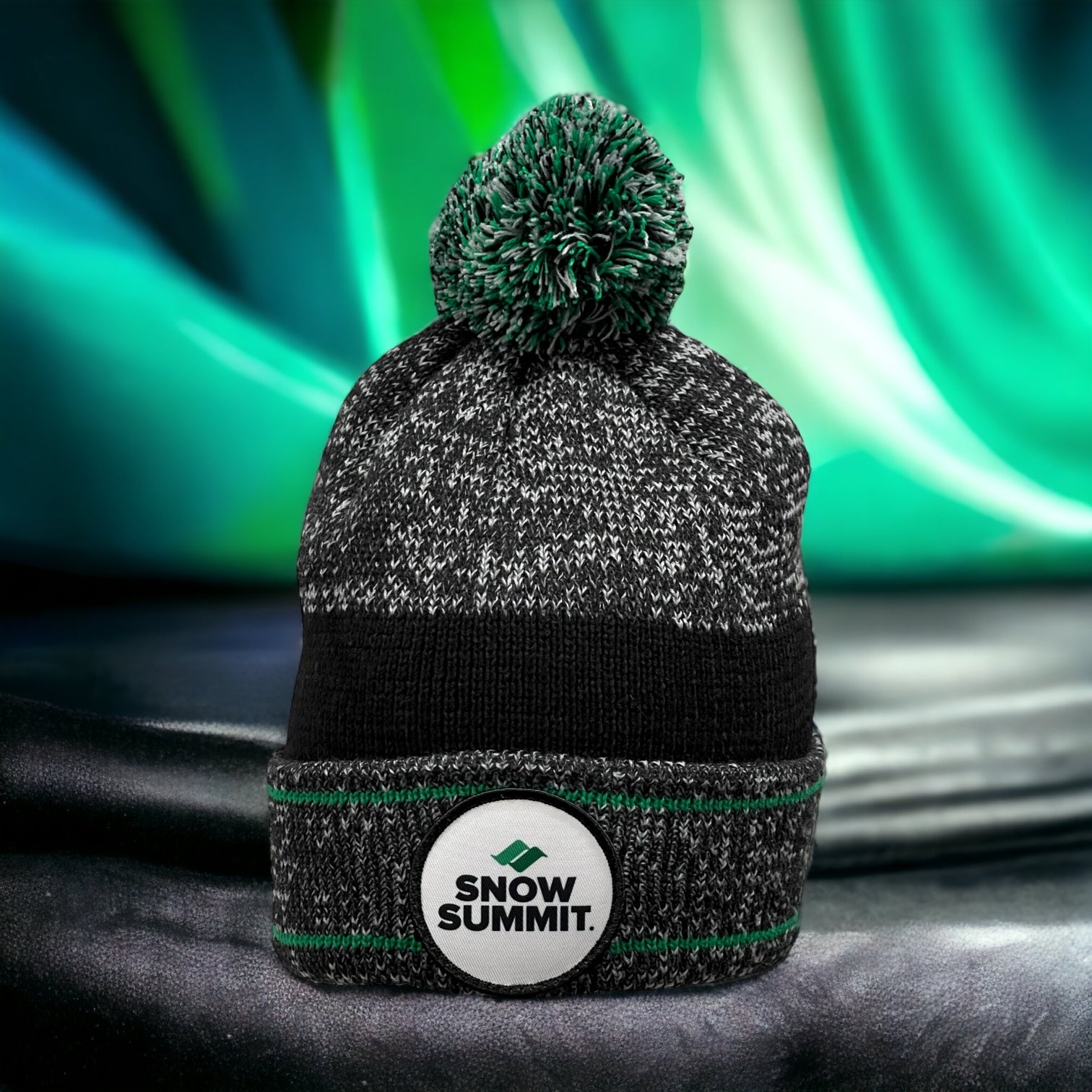 Grey beanie w/ Green accents throughout. Snow Summit Core patch located on front.