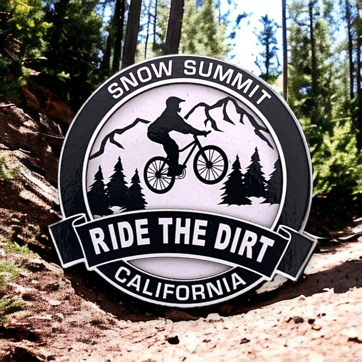 Black and white snow summit ride the dirt california magnet with a mountain biker riding on the forest